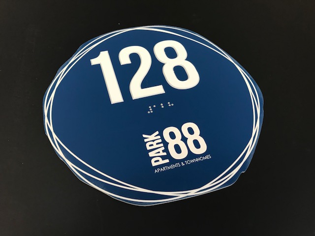Park 88 ADA Compliant Circle Sign with Number 128 in Braille